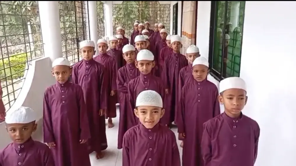 Students lined up in the campus hallway